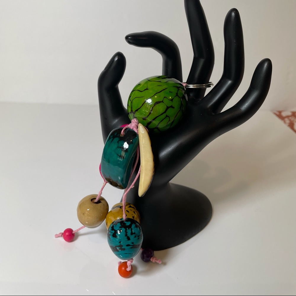 Handmade Keychain in Tagua Seed in various colors.